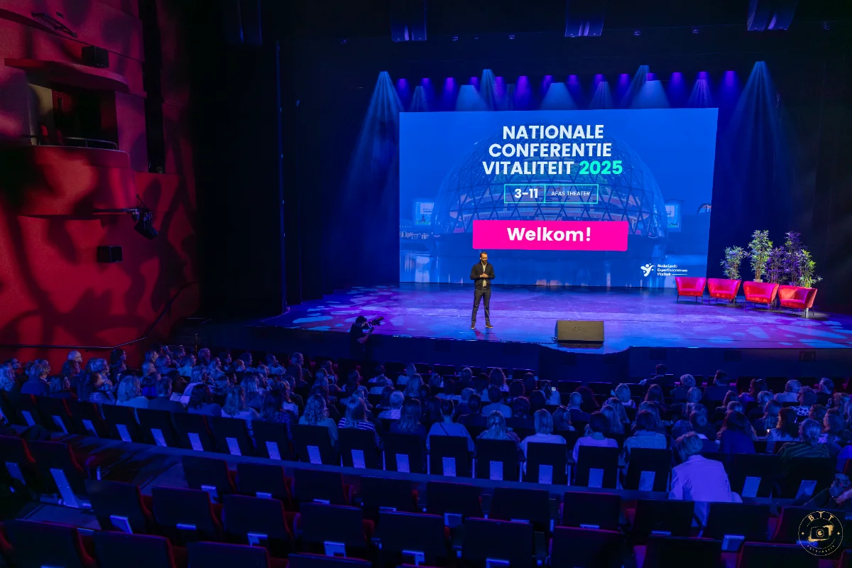 Sfeerfoto vorige editie — zaal